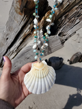 the pendant is extra large - 4" , I can make another necklace with a smaller shell option