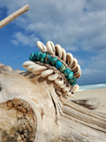 crocheted base hemp bracelet with sliced cowrie shells and sea sediment beads