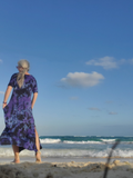 A back view with the gorgeous waves in the background