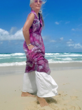 the dress has side pockets, and is fun worn with loose leg pants