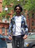a front view taken on the streets of Brookyn- Daniel has a white tee under the unbuttoned jacket.