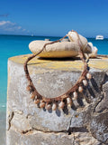 dainty crocheted hemp necklace with tiger moon shells