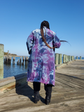back view of the same jacket style, a size 3x on a curvy model.