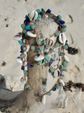 sliced cowrie shells with blue-green gemstone beads