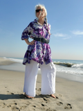 I changed the look of this big shirt by wearing a belt around my waist - the wide leg linen pants go really well with it too! Ocean waves in the back