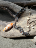 Zebra Shell Clusters with an Orange White Shell Pendant