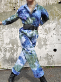 a close up- arms out, legs across