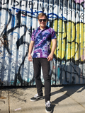 Rob is standing front of a graffiti wall
