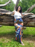 A fun "nature" photo; Katie has her arms up on the old dried up tree