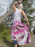 a back shot of the skirt - the fron waistband is adjustable with the ties, the back part has an elastic band.. The right side is shorter than the left