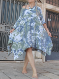 showing off the shape of this fishtail hem design