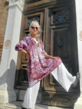 wear t as a tunic, or by itself as a  dress