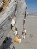 a beach photo; crocheted rope with shell charms