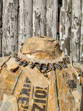 the choker displayed on a paper Mache form