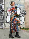My pretty size 4 model is wearing a size small long duster cardigan.I hand dyed it in navy-olive-navy colors, creating this earthy but colorful combo. Mariana is wearing a crop top, blue skinny jeans and combat boots with this outfit. Side view.