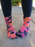 one size tube socks in pink orange black tie dye