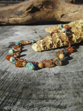 sea sediment, carnelian, picture jasper beads crocheted on a light brow nylon thread