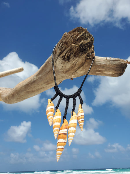 Long orange striped shells crocheted  on a leather choker