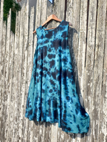 Blue tie-dye dress on a wooden surface