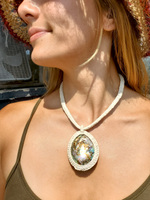 this necklace worn by a young woman
