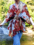 A cloes up; I'm standing front of a pretty waterfall in CT.  The original color was an ash grey shade; I added my tie dye; brown-khaki-rust-orange. Due to the fuzzy surface, this garment has a hard time absorbing the added dye, and the finished  colors & pattern are very interesting