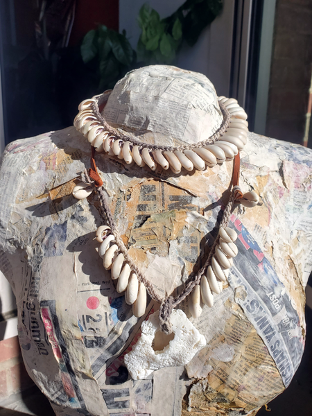 Displayed on my paper Mache form; there are 2 different shell necklaces, sold separately