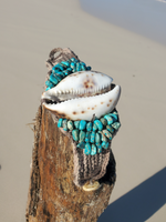 super chunky beaded bracelet with a sliced cowrie shell