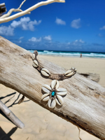 beach mood / 6 shell petal flower pendant with a blue bead in the center