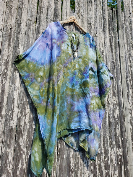 Colorful fabric draped over a wooden surface
