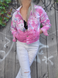 A cropped stretchy denim jacket with all the usual jacket features; Metal buttons, chest pockets with buttoned flaps, size pockets. This one here is hand dyed in light pink and wisteria colors. 