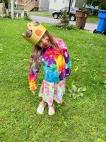 a 5 year old little girl wearing her new birthday present - the photo was sent in by her grandmother.