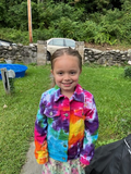 another happy little girl in her rainbow tie dye jacket - the patterns are all individual and one of a kind!