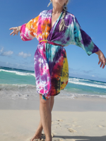 photographed at the beach. Bright colors just above the knee length