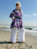 I changed the look of this big shirt by wearing a belt around my waist - the wide leg linen pants go really well with it too! Ocean waves in the back 
