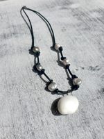 Knotted Leather Cord with Grey Pearls and  a Moon Shell Pendant