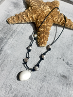 Knotted Leather Cord with Grey Pearls and  a Moon Shell Pendant