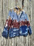 Tie-dye jacket on a wooden surface