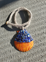 crocheted linen rope with a beaded shell pendant