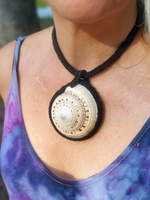 Shell choker with black crocheted rope, and a large sundial shell - see the jewelry section of this shop for more