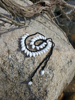 displayed on a big rock at the beach