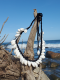 pretty white shells crocheted on a black hemp cord, adjustable long ties