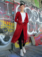 My model Kelsie who is 5'11" tall modeling a barn red hand dyed long duster cardigan. The ribbed rayon jersey garment has extra long sleeves with thumbholes, an open front & patch pockets. see next alt text