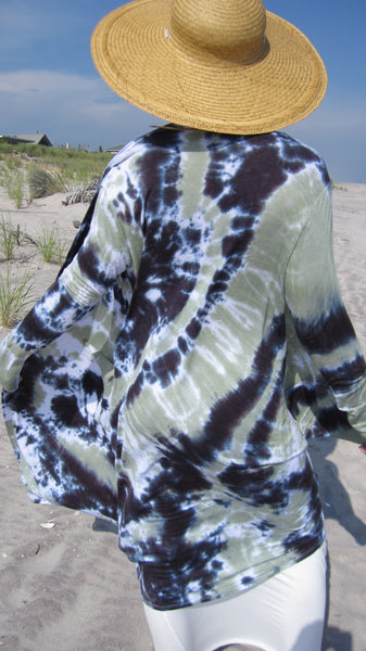 A close up of her back, wind blowing the outfit. The rayon stretchy fabric holds the colors really well!