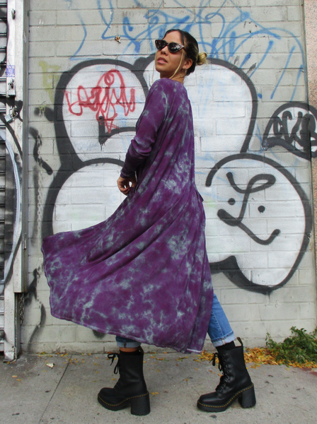 Mariana, a size 4 model wearing my long dusty purple cardigan. This photo i showing in motion; stepping sideways, slightly turning towards the camera, the flowy long cardigan is "moving" around her at the bottom.