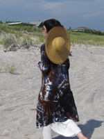 A mostly back shot; showing the pretty hand dyed colors, Steph is "walking away", the hat is on her back