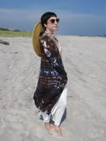 Beach photoshoot with my daughter Stephanie; she has a white bikini top and a white maxi skirt on; the midi cardigan has an open front, patch pockets, and hand dyed earthy colors - black-brown