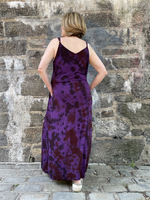 back view of the dress; Jodi's hands are in the pockets, you can see the adjustable straps