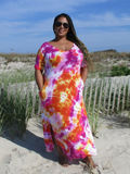 My Sexy Diva maxi dress modeled by Mu" she is a curvy XL beauty, modeling a size 1XL. The dress has a deeper V-neckline, a bit longre that usual short sleeves,  side pockets and side slits. And a fabulous bright tie dye color combination; pinks, orange, hint of purple